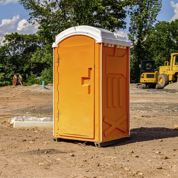 what is the cost difference between standard and deluxe portable restroom rentals in Stow New York